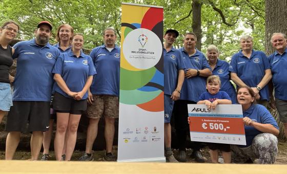 Gruppenfoto mit Sportlern